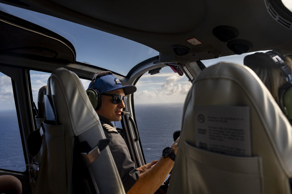 Pilot Tone narrating the tour inside Maverick Helicopters ECO-Star over the Pacific Ocean Maui